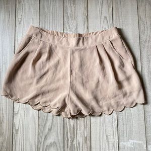Mine tan polyester shorts. Size Medium